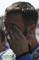 2007 Corona AMA Superbike Championship - Jake Holden - Portrait: A, D, M, T... No, Jordan Suzuki rider Jake Holden was not being fitted for glasses, just a little post race dust in the eye.